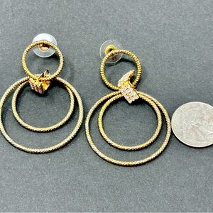 Gold plated rhinestone hoops.